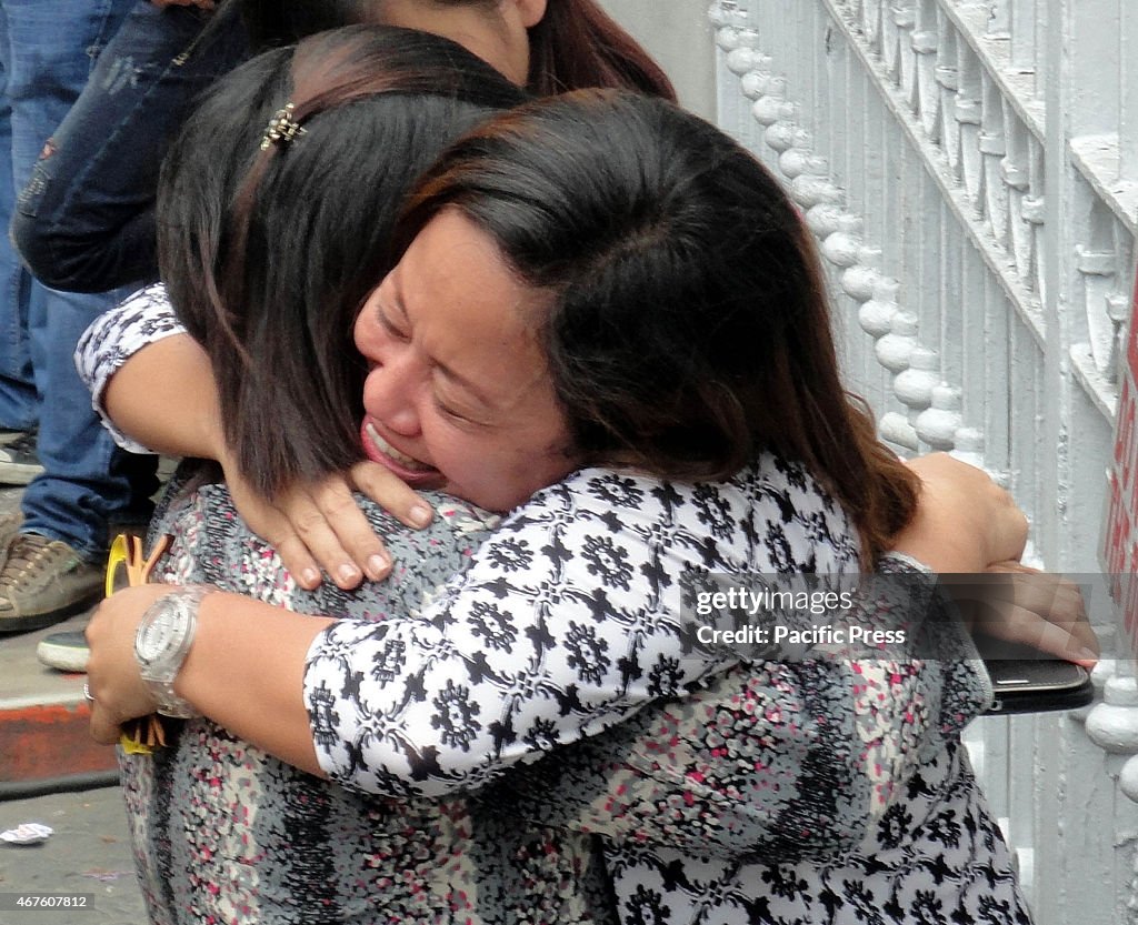 Relatives of Veromic Narida, who passed the 2014 Bar Exams,...