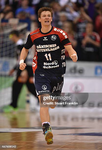 Lasse Svan of Flensburg celebrates during the DKB Bundesliga handball match between SG Flensburg-Handewitt and FA Goeppingen on March 25, 2015 in...