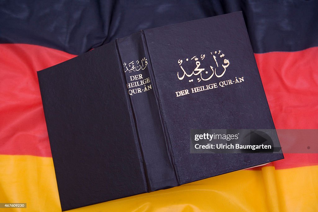 Qur'an (Koran) and German flag.