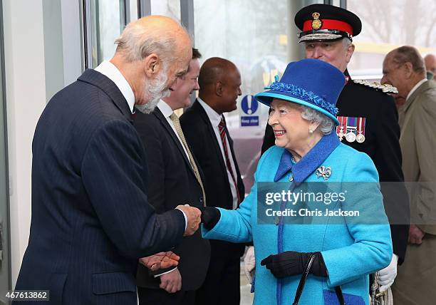 Queen Elizabeth II greets Prince Michael of Kent as she visits the National Memorial to the Few to open a new wing on March 26, 2015 in Folkestone,...