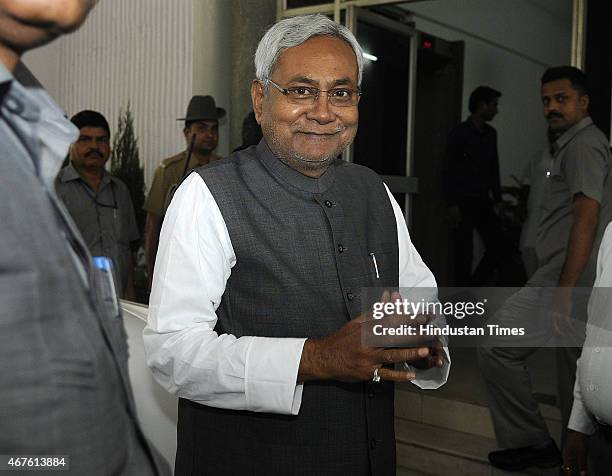 Bihar Chief Minister Nitish Kumar leaves Bihar Bhawan for the meeting with Prime Minister Narendra Modi at South Block on March 26, 2015 in New...