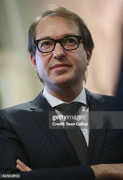 German Transport Minister Alexander Dobrindt speaks to members of the media about Germanwings flight 4U9525 following a press conference on March 26,...