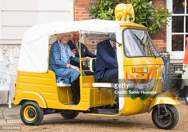 Prince Charles, Prince of Wales and Camilla, Duchess of Cornwall ride in a rickshaw as they launch 'Travels to my Elephant' Rickshaw Race at Clarence...