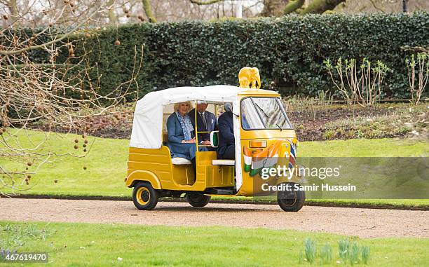 Prince Charles, Prince of Wales and Camilla, Duchess of Cornwall ride in a rickshaw as they launch 'Travels to my Elephant' Rickshaw Race at Clarence...