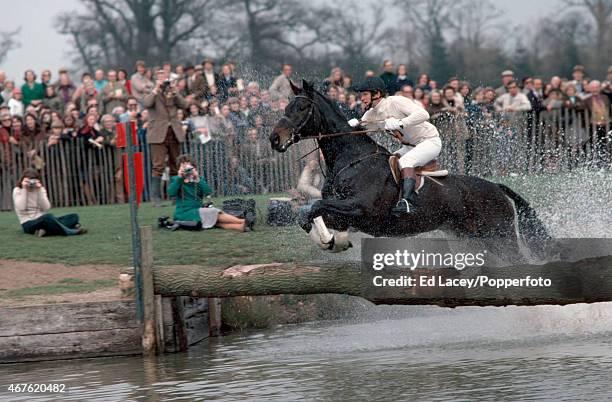 Richard Meade on Jacob Jones taking a jump at the Park Pond during the Badminton Horse Trials on 10th April 1976.