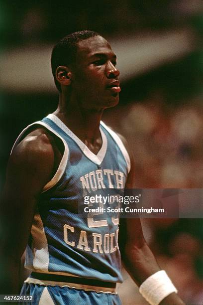 Michael Jordan of the University of North Carolina looks on in 1983. NOTE TO USER: User expressly acknowledges and agrees that, by downloading and/or...