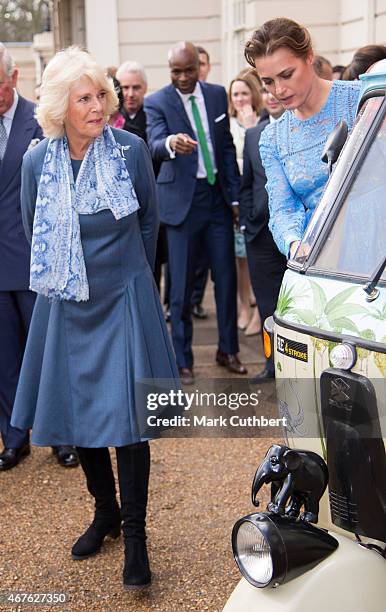 Camilla, Duchess of Cornwall and Yasmin Le Bon at the launch of the Travels To My Elephant Rickshaw Race at Clarence House on March 26, 2015 in...