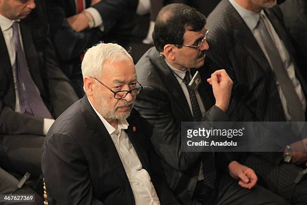 Tunisian Ennahdha Party leader Rached Ghannouchi and former Tunisian Prime minister Ali Laarayedh attend a ceremony at the National Constituent...