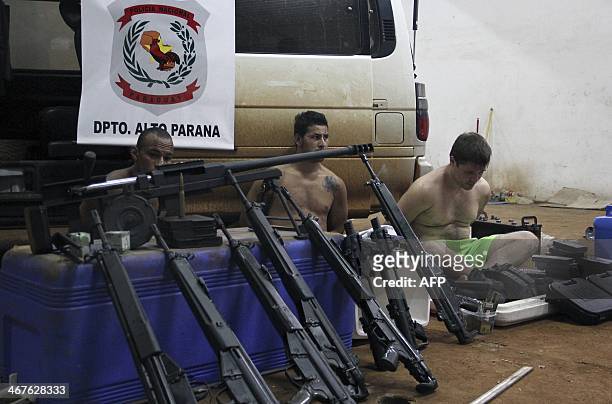 Brazilian nationals Roberto Torres Gonzalez, Antonio Cesar Ibarra and Luis Fernando Cabral and weapons--assault rifles and a caliber 50 sniper...
