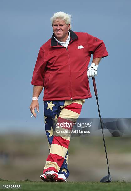 John Daly has a smoke on the 13th tee during the second round of the AT&T Pebble Beach National Pro-Am at the Monterey Peninsula Country Club on...