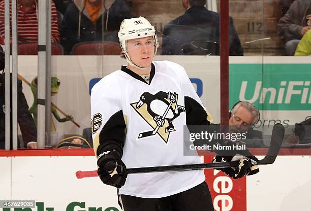 Jussi Jokinen of the Pittsburgh Penguins looks across the ice during a stop in play against the Phoenix Coyotes at Jobing.com Arena on February 1,...