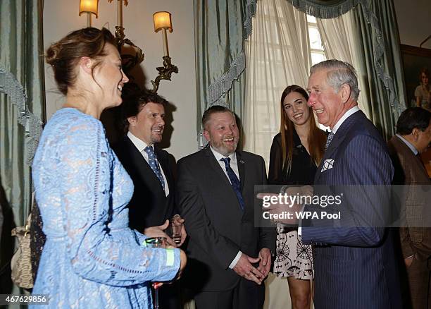 Meets Yasmin Le Bon and her daughter Amber Le Bon greet Prince Charles, Prince of Wales during a reception to launch 'Travels To My Elephant' at...