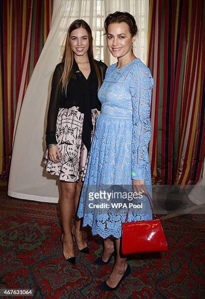 Yasmin Le Bon and her daughter Amber Le Bon attend a reception to launch 'Travels To My Elephant' at Clarence House on March 26, 2015 in London,...