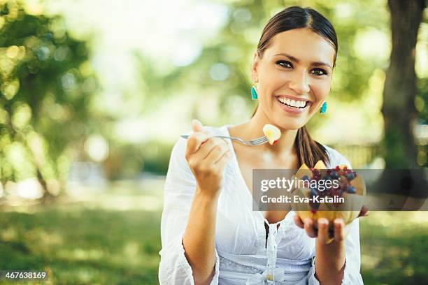 pretty beauty eating fruit salad - fruit salad stock pictures, royalty-free photos & images