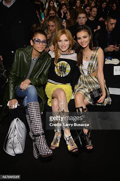 Actresses Zendaya, Bella Thorne, and Victoria Justice attend Rebecca Minkoff fashion show during Mercedes-Benz Fashion Week Fall 2014 at The Theatre...