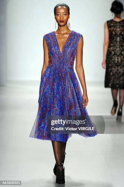 Model walks the runway at Tadashi Shoji Ready to Wear Fall/Winter 2014-2015 fashion show during Mercedes-Benz Fashion Week Fall 2014 at The Salon at...