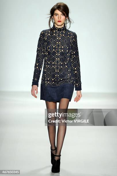 Model walks the runway at Tadashi Shoji Ready to Wear Fall/Winter 2014-2015 fashion show during Mercedes-Benz Fashion Week Fall 2014 at The Salon at...