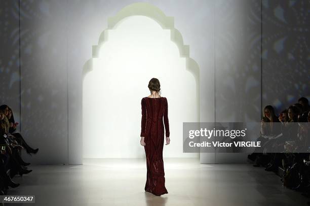 Model walks the runway at Tadashi Shoji Ready to Wear Fall/Winter 2014-2015 fashion show during Mercedes-Benz Fashion Week Fall 2014 at The Salon at...