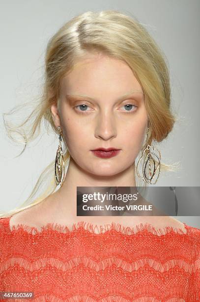 Model walks the runway at Tadashi Shoji Ready to Wear Fall/Winter 2014-2015 fashion show during Mercedes-Benz Fashion Week Fall 2014 at The Salon at...