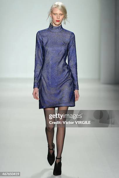 Model walks the runway at Tadashi Shoji Ready to Wear Fall/Winter 2014-2015 fashion show during Mercedes-Benz Fashion Week Fall 2014 at The Salon at...