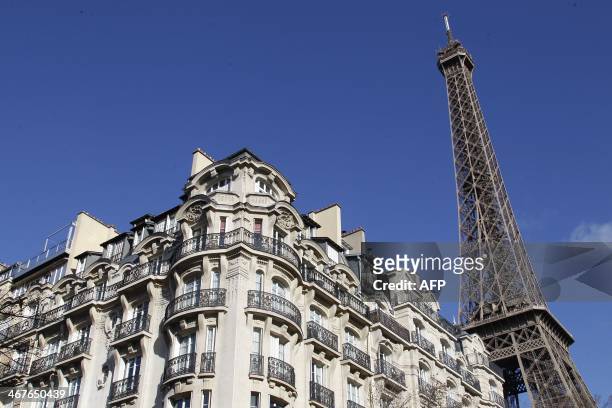 Photo taken on February 7, 2014 shows buildings and luxury flats near the Eiffel tower in Paris. AFP PHOTO / LUDOVIC MARIN