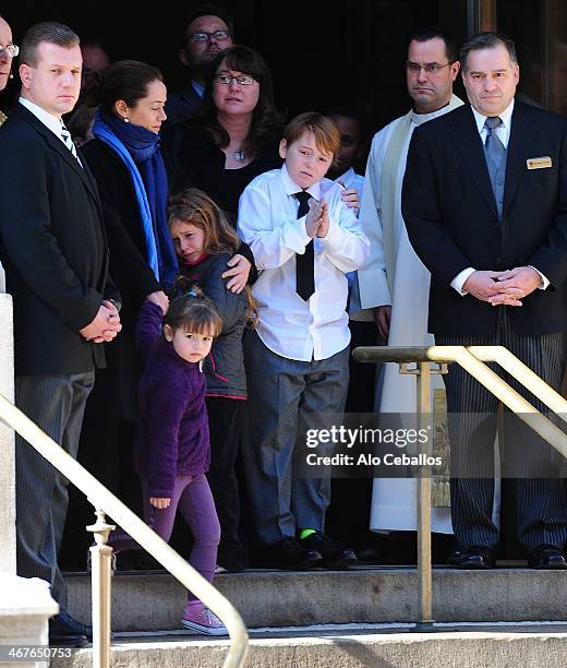 Mimi O'Donnell, Cooper Alexander Hoffman, Tallulah Hoffman and Willa Hoffman attend the funeral service for actor Philip Seymour Hoffman who died of...