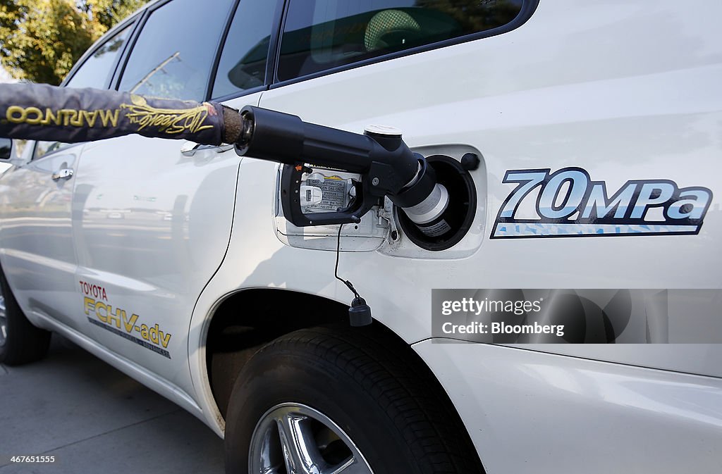 A Hyundai Motor Co. Fuel Cell Vehicle And A Hydrogen Fueling Station