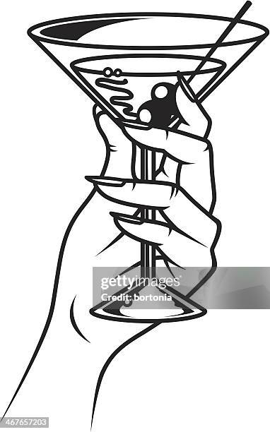 vintage hand holding martini - martini stock-grafiken, -clipart, -cartoons und -symbole
