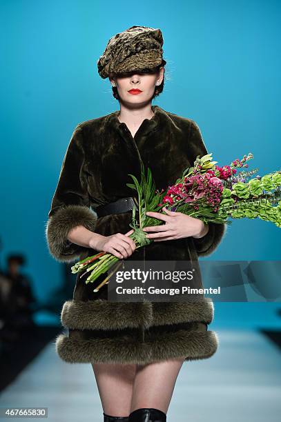 Model walks the runway wearing Farley Chatto fall 2015 collection during World MasterCard Fashion Week Fall 2015 at David Pecaut Square on March 26,...