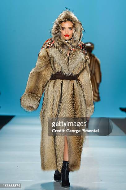 Model walks the runway wearing Farley Chatto fall 2015 collection during World MasterCard Fashion Week Fall 2015 at David Pecaut Square on March 26,...