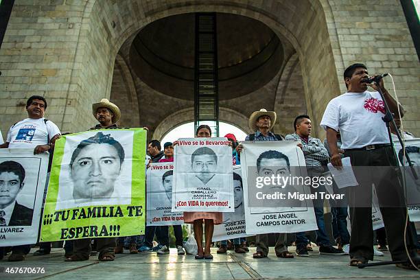 Relatives of the 43 missing students of Ayotzinapa college protest during a rally to ask Mexican authorities to continue the search for the 43...