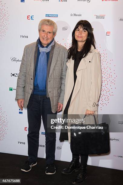Director Claude Lelouch and wife Valerie Perrine attend the Lumiere! Le Cinema Invente exhibition preview on March 26, 2015 in Paris, France.