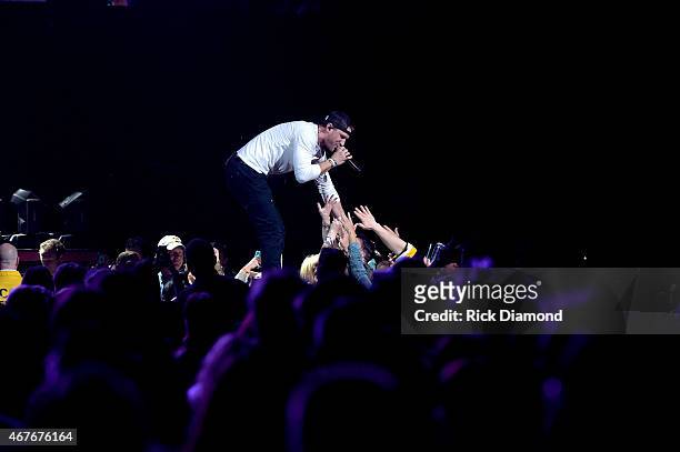 Singer-songwriter Chase Rice performs onstage during Kenny Chesney's The Big Revival 2015 Tour kick-off for a 55 show run through August. The...
