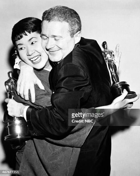 Pictured: Miyoshi Umeki winner of Best Supporting Actress for "Sayonara", Red Buttons Best Supporting Actor for "Sayonara" during the 30th Annual...