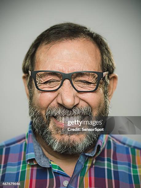 portrait of a happy caucasian man with glasses and beard. - cheesy grin stock pictures, royalty-free photos & images