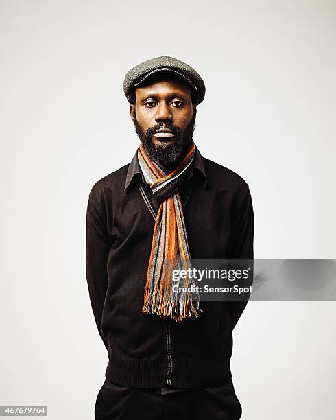 african mid age man portrait with beard. - cool guy in hat stock pictures, royalty-free photos & images