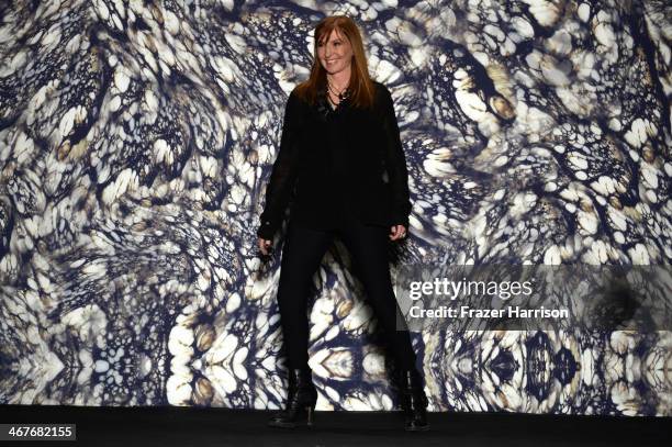Designer Nicole Miller poses on the runway at Nicole Miller fashion show during Mercedes-Benz Fashion Week Fall 2014 at The Salon at Lincoln Center...