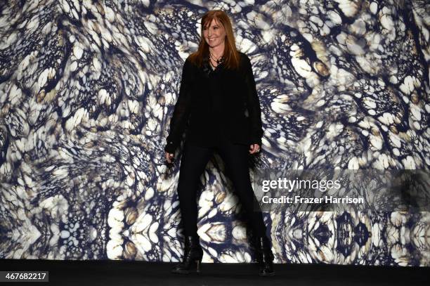 Designer Nicole Miller poses on the runway at Nicole Miller fashion show during Mercedes-Benz Fashion Week Fall 2014 at The Salon at Lincoln Center...