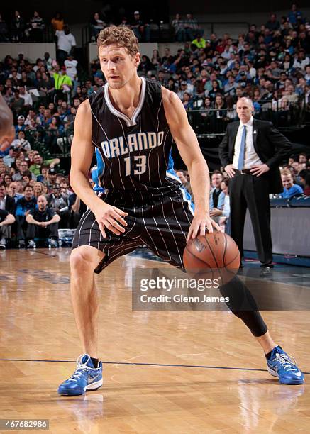 Luke Ridnour of the Orlando Magic handles the ball against the Dallas Mavericks on March 18, 2015 at the American Airlines Center in Dallas, Texas....