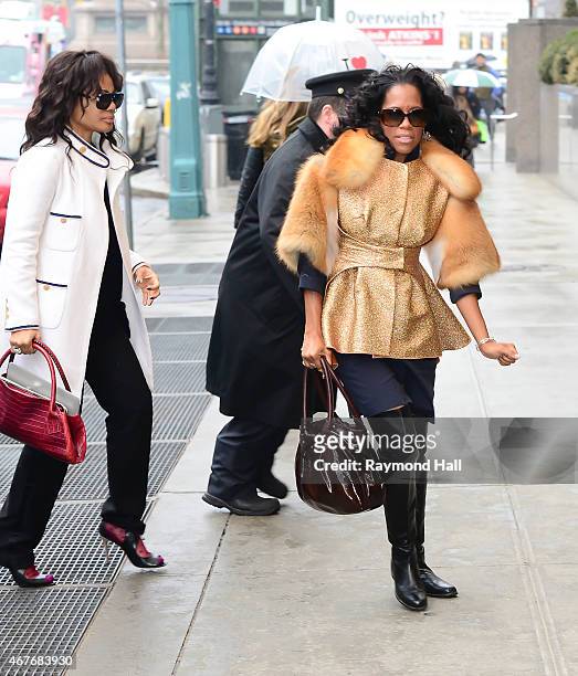 Actresses Kimberly Elise and Regina King are seen in Midtown on March 26, 2015 in New York City.