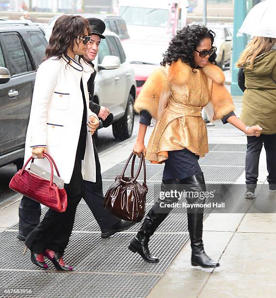 Actresses Kimberly Elise and Regina King are seen in Midtown on March 26, 2015 in New York City.