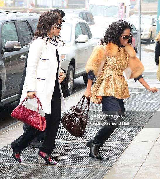 Actresses Kimberly Elise and Regina King are seen in Midtown on March 26, 2015 in New York City.