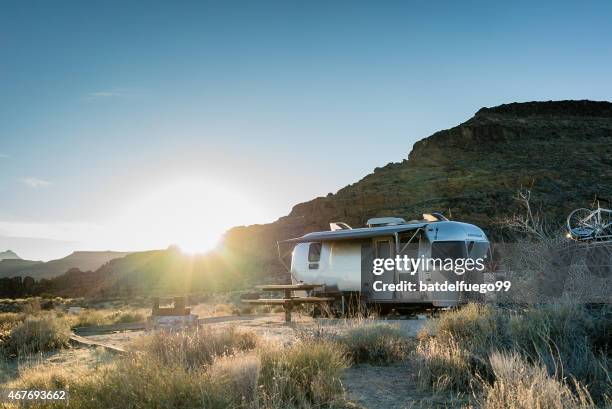 airstream trailer in mojave desert at sunset - utility trailer stock pictures, royalty-free photos & images