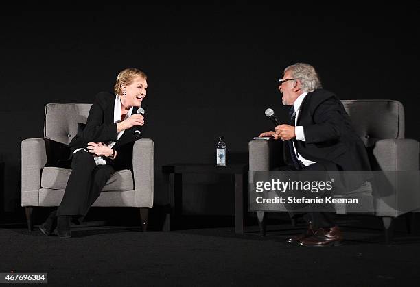 Actress Julie Andrews and First Vice President of the Academy of Motion Pictures Arts and Sciences Sid Ganis speak onstage at the Opening Night Gala...