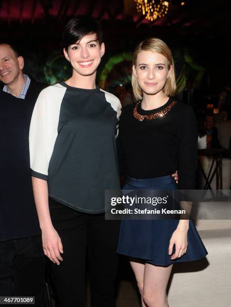 Actresses Anne Hathaway and Emma Roberts attend Hollywood Stands Up To Cancer Event with contributors American Cancer Society and Bristol Myers...