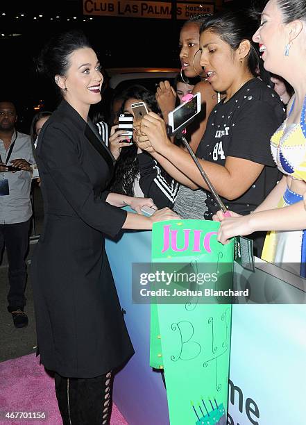 Singer-songwriter Katy Perry poses with fans during EPIX and Time Warner Cable World Premier Screening Of "Katy Perry: The Prismatic World Tour" at...