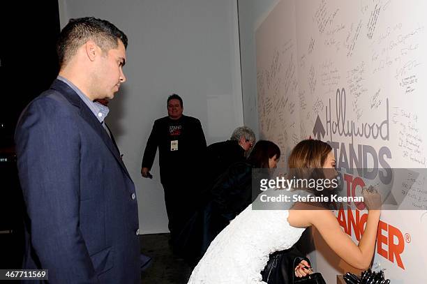 Producer Cash Warren and actress Jessica Alba attend Hollywood Stands Up To Cancer Event with contributors American Cancer Society and Bristol Myers...