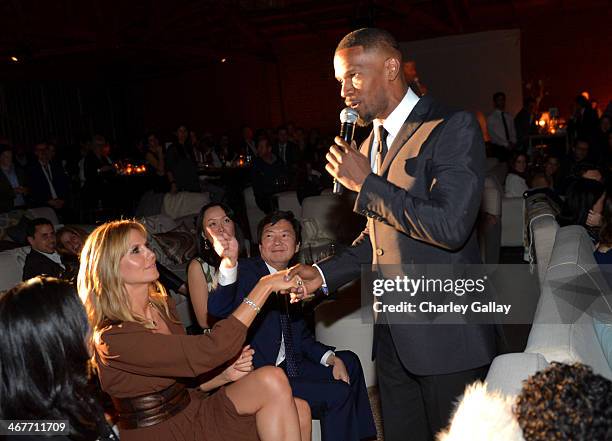 Actor/singer Jamie Foxx performs onstage and model Heidi Klum attends Hollywood Stands Up To Cancer Event with contributors American Cancer Society...