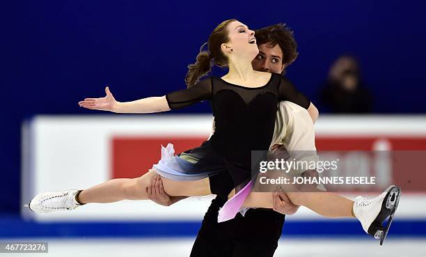 Alexandra Paul and Mitchell Islam of Canada perform during their ice dance free dance of the 2015 ISU World Figure Skating Championships at Shanghai...