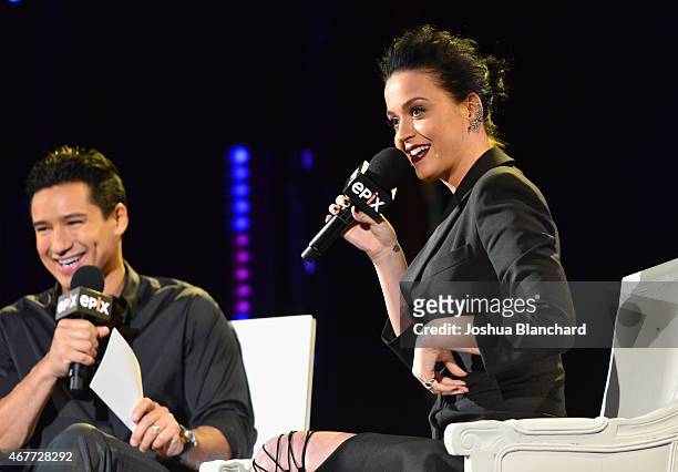 Personality Mario Lopez and singer-songwriter Katy Perry speak onstage during EPIX and Time Warner Cable World Premier Screening Of "Katy Perry: The...